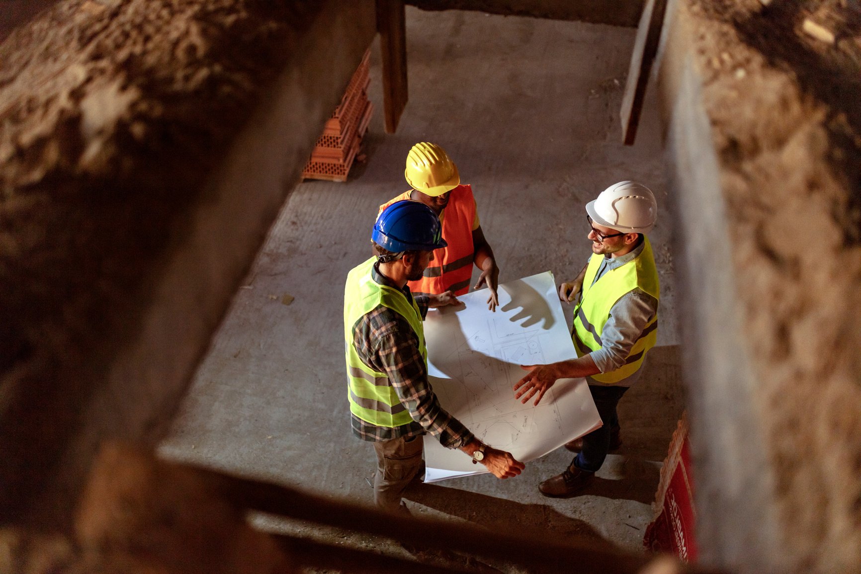 Construction team discussing at site